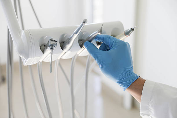 Professional Tooth Extraction technician working in Saline County County, AR